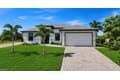 6 NW 9th St