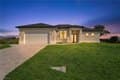 411 NE 25th St