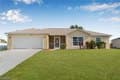 323 NW 10th St